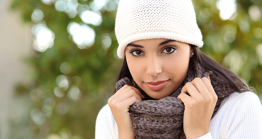 Girl in a beanie with a scarf on