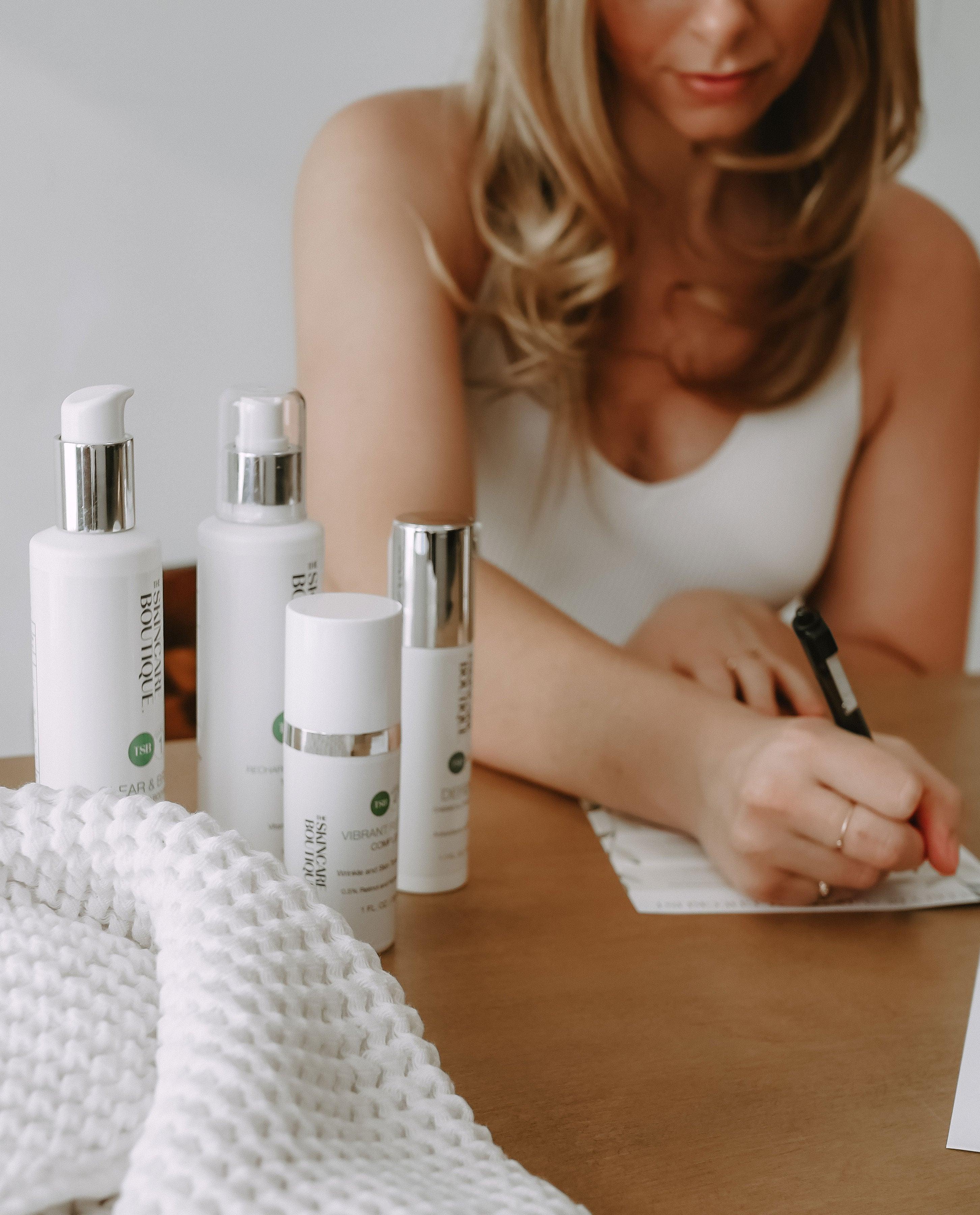 Woman practicing holistic self-care as part of the Boutique Society membership experience