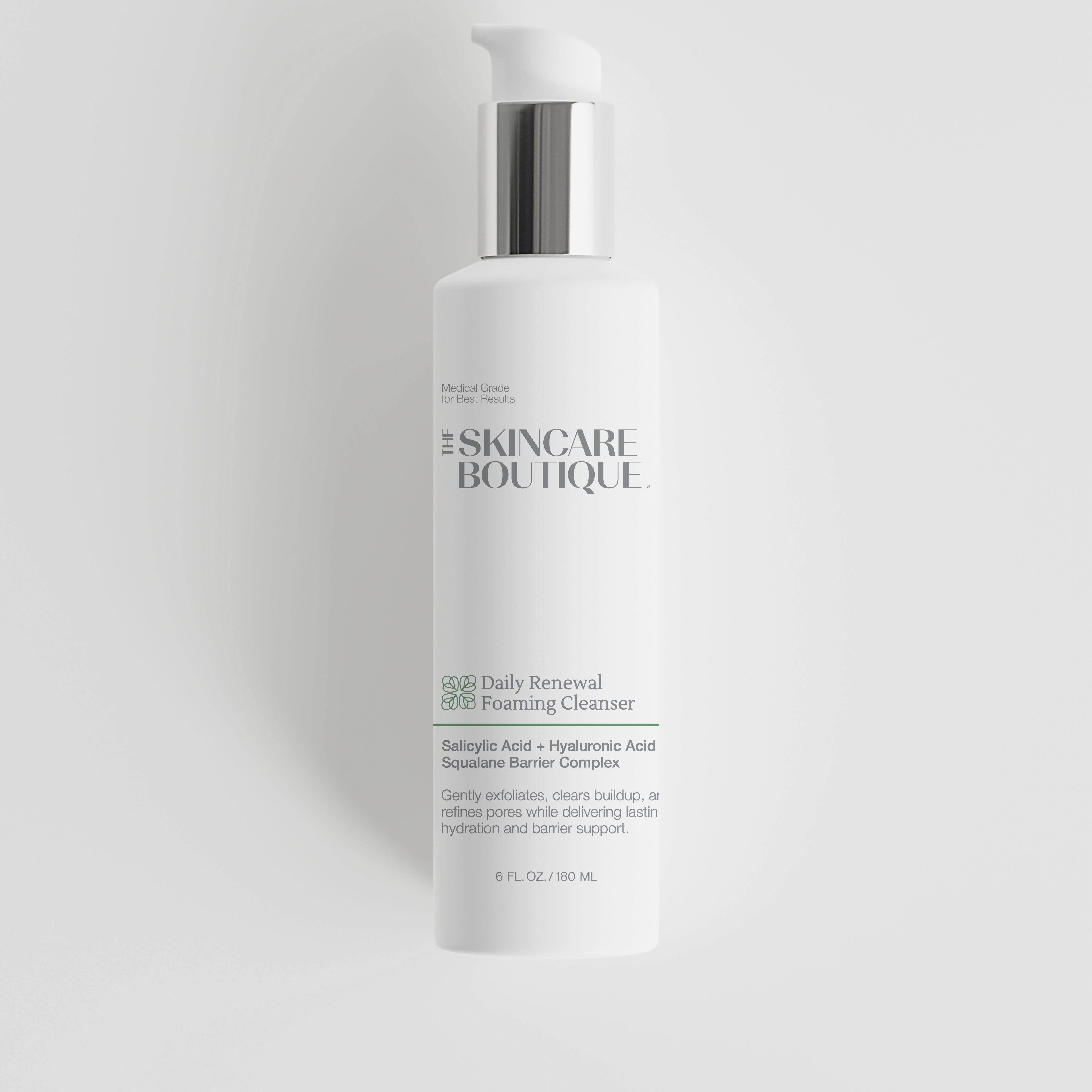 A white skincare pump bottle from The Skincare Boutique, labeled 'Daily Renewal Foaming Cleanser', set against a solid light gray background.