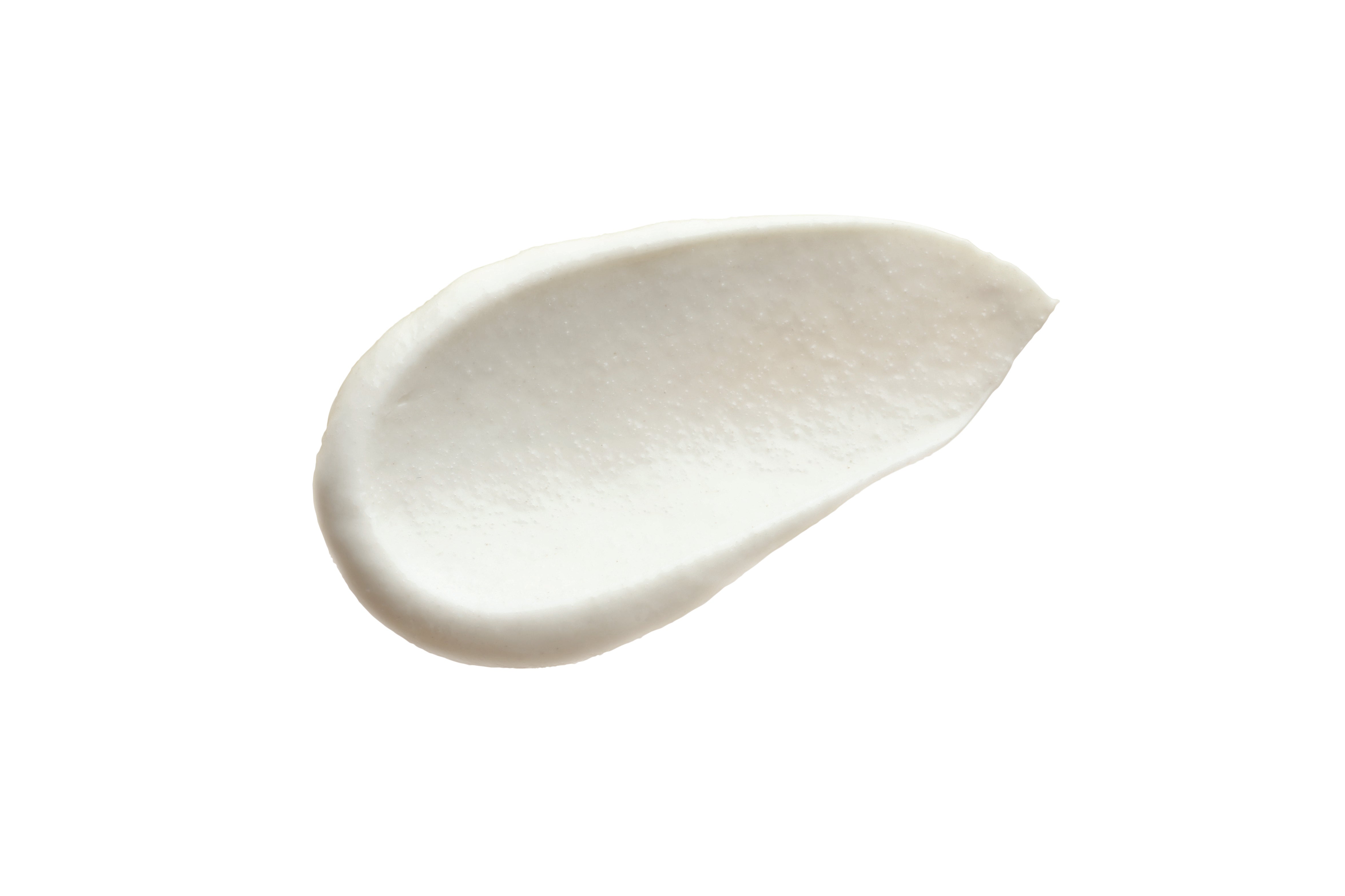 A smooth, creamy white product smear, likely a cosmetic cream or lotion, shown on a solid white background.