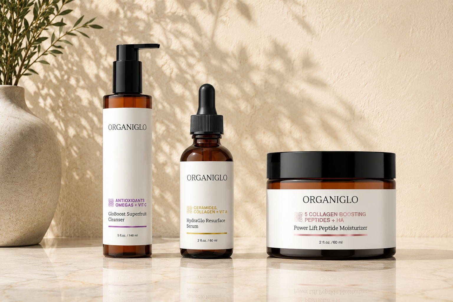superfruit cleanser, resurfacing serum, and peptide moisturizer on a marble ledge